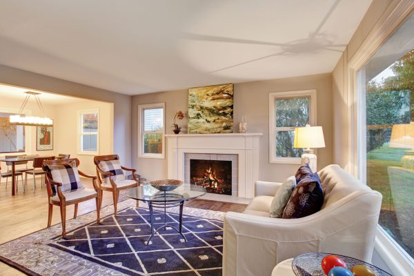 41629774 - brilliant hardwood living room with decor, and a fireplace.